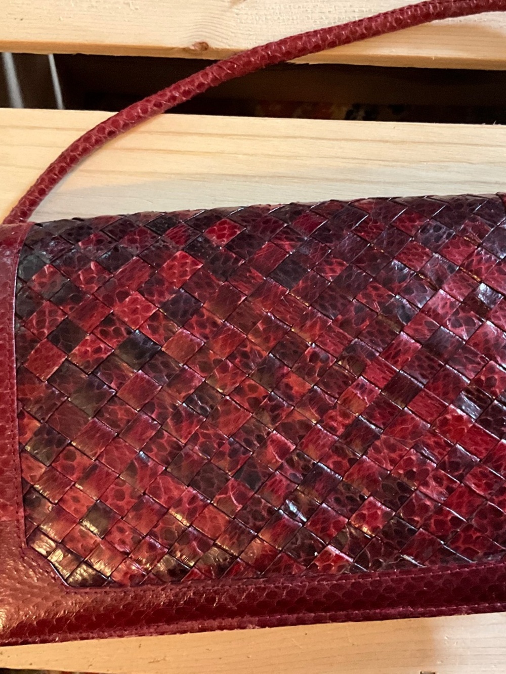Woven red snake skin shoulder bag
